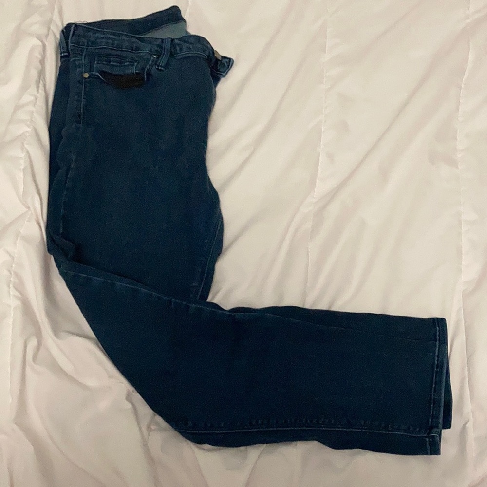 Dark skinny blue jeans